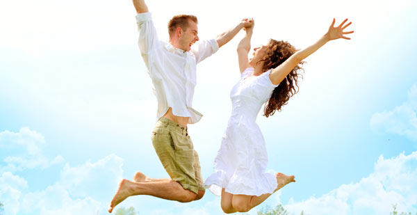 Happy-Couple-Jumping